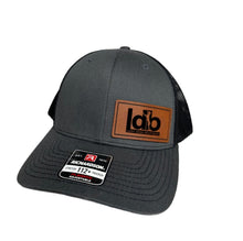 Load image into Gallery viewer, Custom Richardson Hat with Leather Patch Engraved Logo Trucker Cap | Branded Company Hats | Personalized Team Hats for Business
