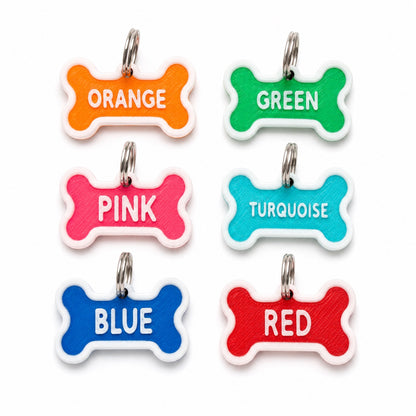 Six personalized dog bone tag colors with split rings
